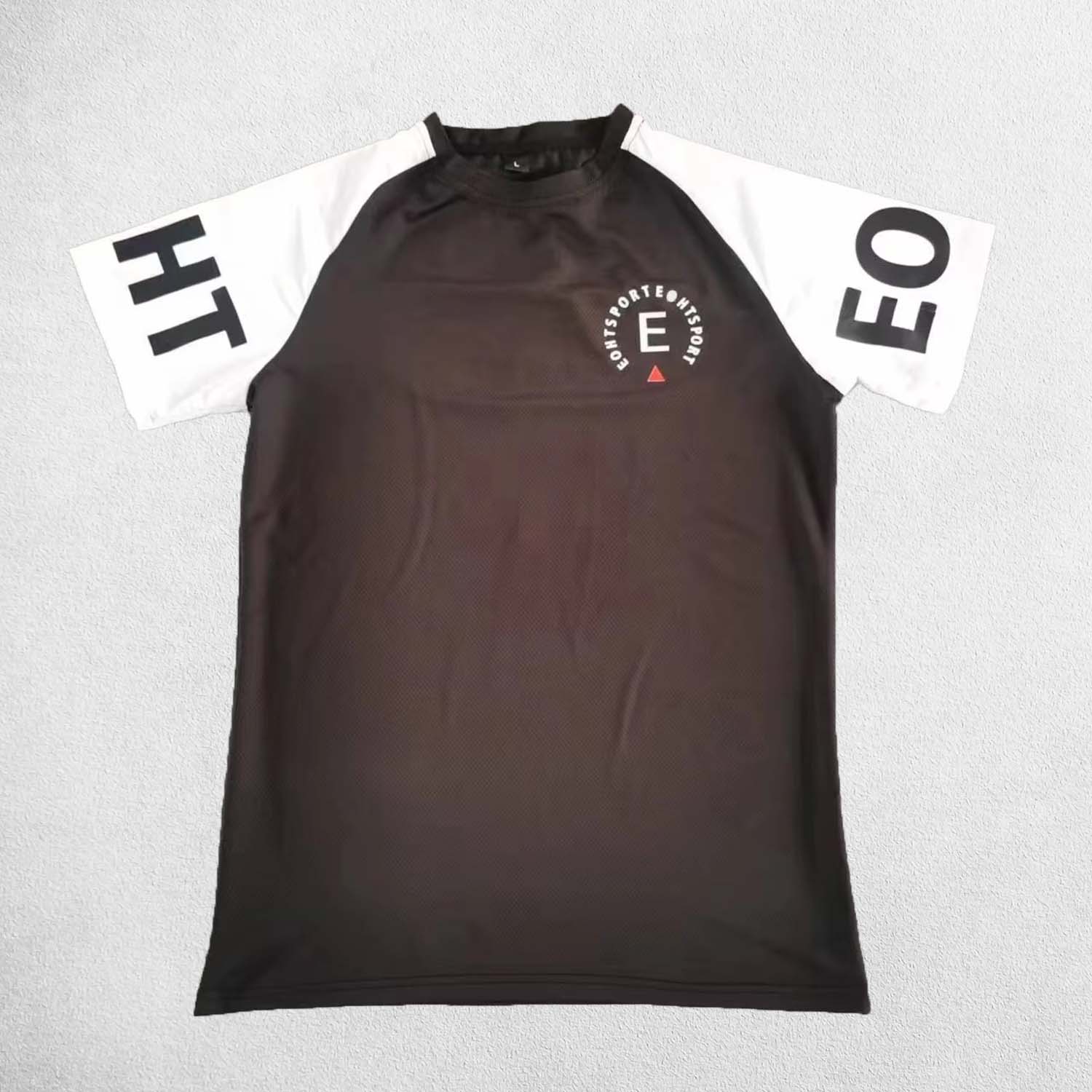Front close up of Black Men’s Quick-Dry Raglan Gym T-Shirt – Breathable, Stretch-Fit Sports Tee for Running & Training