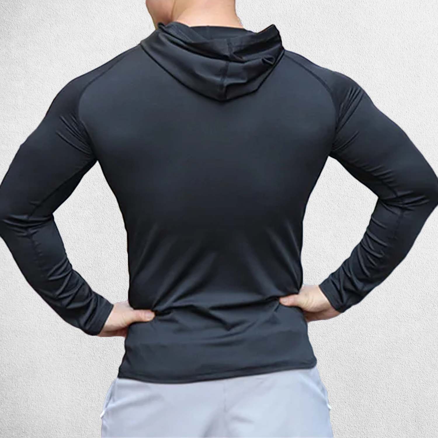 Back view of the Black hoodie with a focus on its breathable polyester material and comfortable fit.
