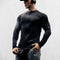 Black Men’s slim-fit compression shirt with zipper and stretch fabric, side profile.