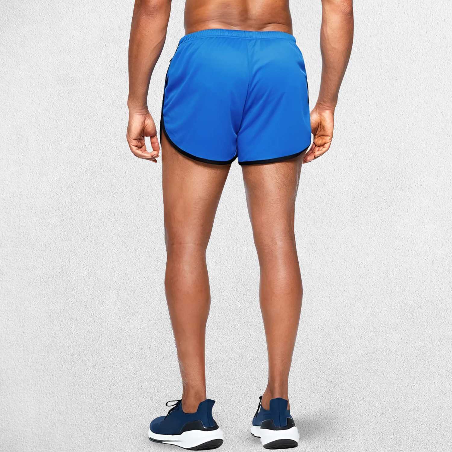 Model Wearing Black GPW Men’s Running Shorts - Gym Fitness, Football & Beach Wear in a studio background