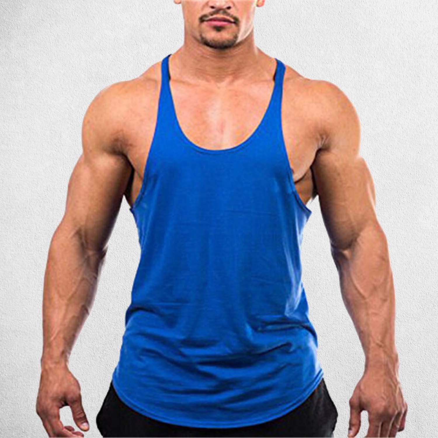 Front View of Model Wearing Blue Men's Solid Color Cotton Y-Back Sleeveless Tank Tops for Gym Muscle Training & Athletic Workout