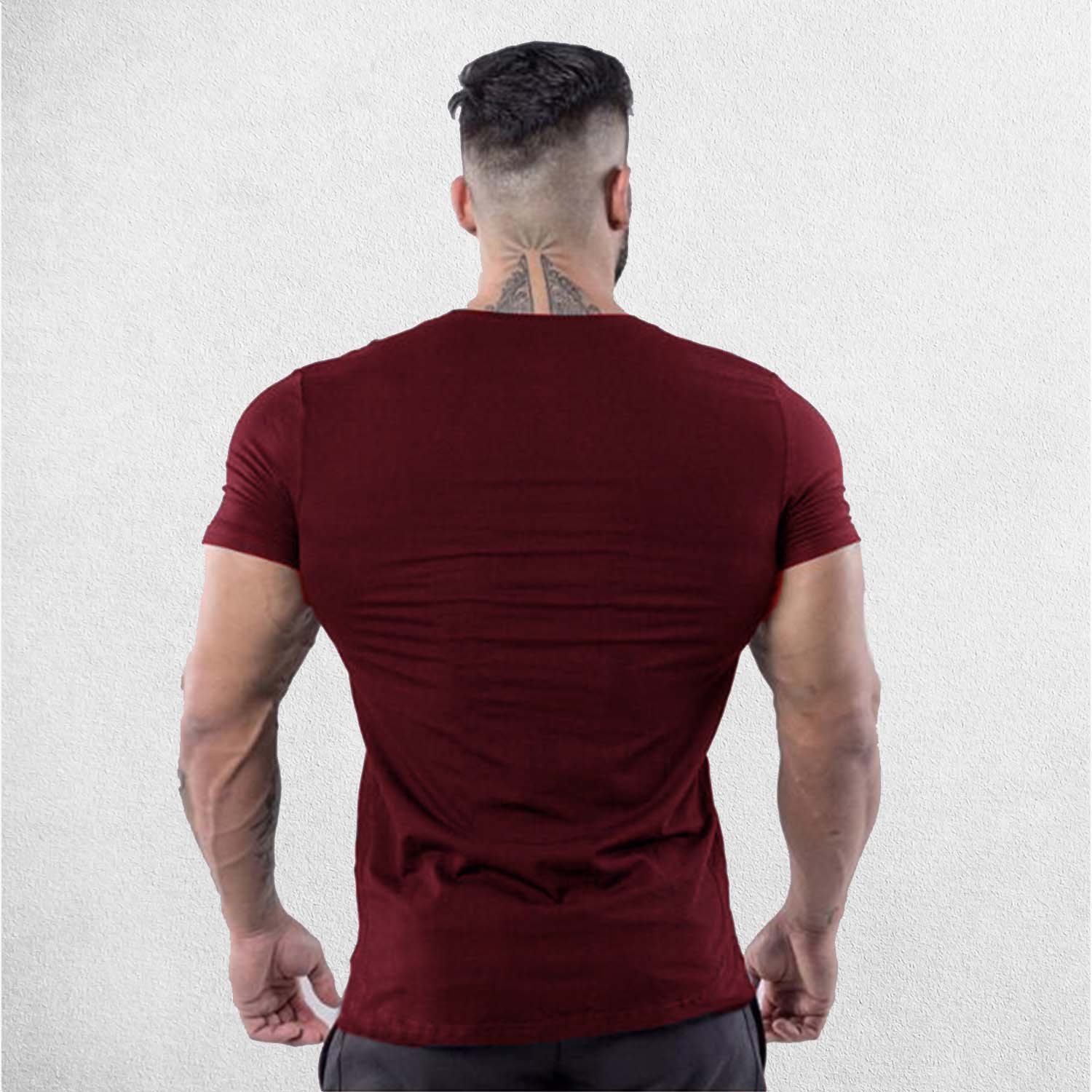 Back View of Model Wearing Burgundy Men’s Slim-Fit Cotton Gym T-Shirt – V-Neck Short Sleeve Workout & Bodybuilding Tee