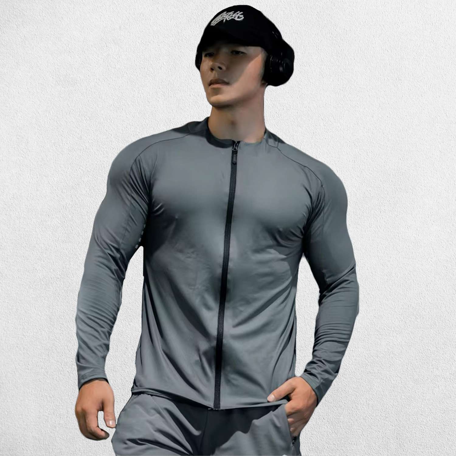 Dark Grey Men’s slim-fit compression shirt with zipper and stretch fabric, Front profile.