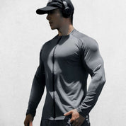 Dark Grey Slim-fit men’s compression T-shirt with zipper, lightweight design, side view.