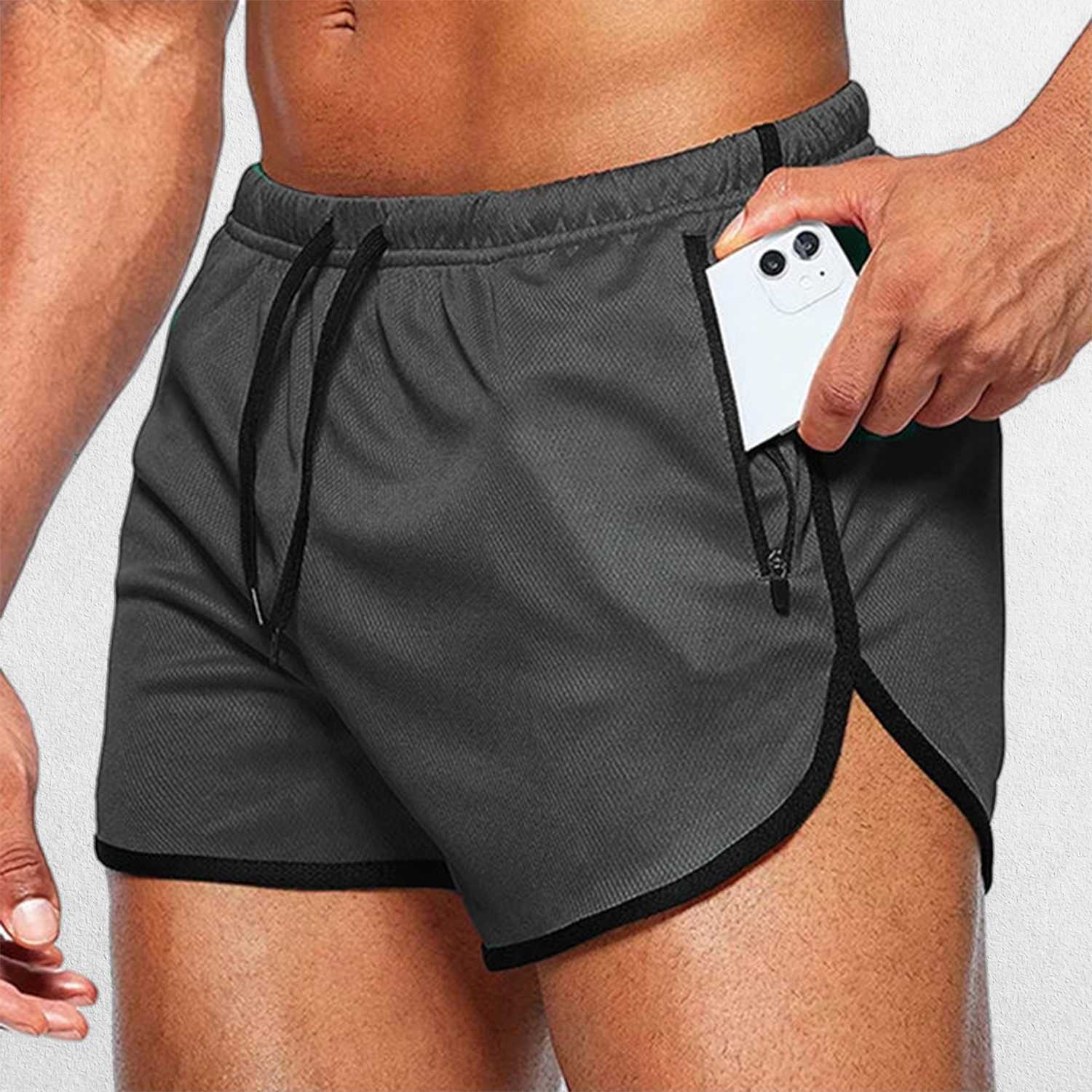 Close-up of Model Wearing Dark Gray GPW Men’s Running Shorts - Gym Fitness, Football & Beach Wear