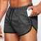 Close-up of Model Wearing Dark Gray GPW Men’s Running Shorts - Gym Fitness, Football & Beach Wear