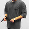 Model wearing Dark Grey GPW Men's Oversized T-Shirt - Casual Gym Bodybuilding Top