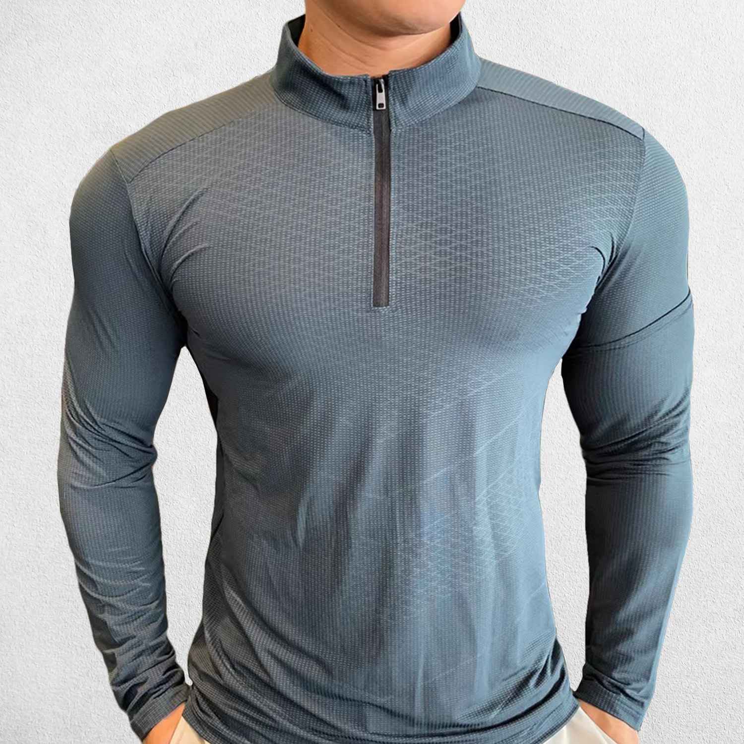 Front Pose of Model wearing Dark Grey Men's Activewear Sweat-Wicking High Collar Compression Top with Long Sleeves