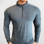 Front Pose of Model wearing Dark Grey Men's Activewear Sweat-Wicking High Collar Compression Top with Long Sleeves
