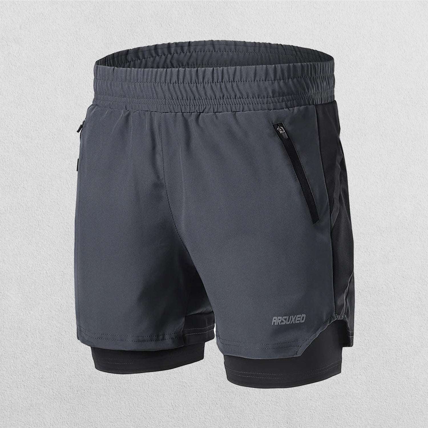 Close-up of Dark Grey Men’s Breathable 2-in-1 Gym Shorts with Zipper Pockets & Drawstring Fit in a studio background