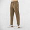 Model side pose wearing Wrinkle-free and durable design of GPW Men’s Lightweight Joggers.