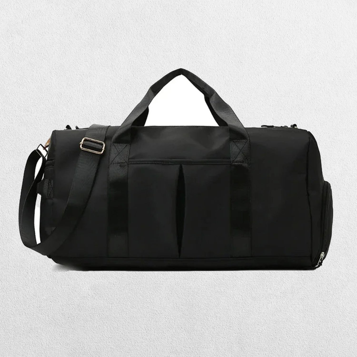 Black coloured gym bag laid flat, featuring a spacious main compartment, sturdy straps, and durable material, perfect for carrying workout essentials and athletic gear.