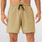 Flexible fit of GPW Men's Performance Shorts in Lion Color during workout sessions