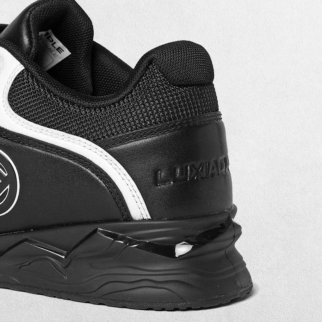 Close up of Black raised heel promoting proper form during a squat.