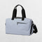 Grey Stylish gym bag in a studio setting.