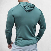 Back view of the Green hoodie with a focus on its breathable polyester material and comfortable fit.