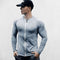 Grey Blue Slim-fit men’s compression T-shirt with zipper, lightweight design, front view.