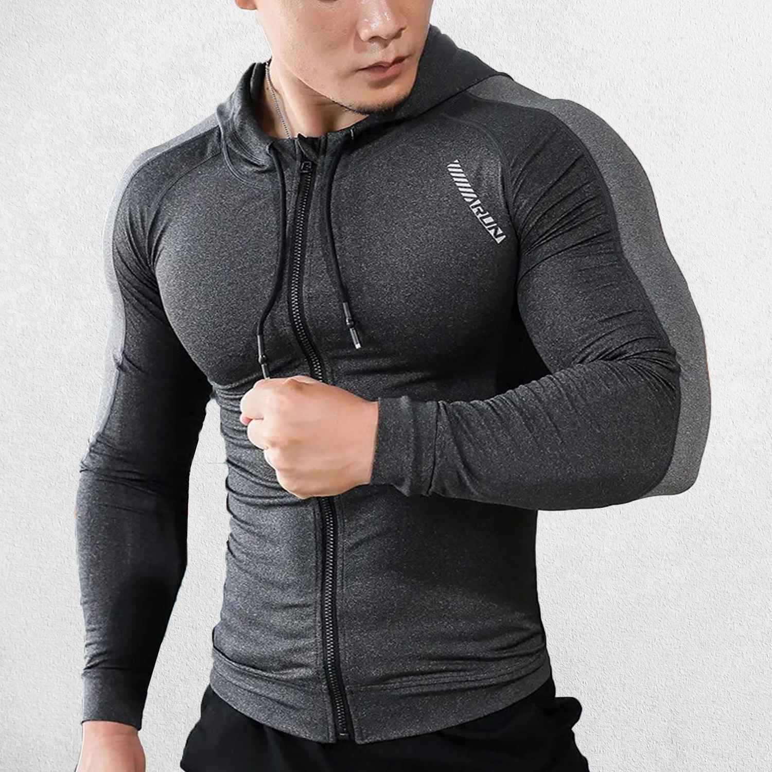 Mode Wearing Grey Men's quick-drying fitness hoodie with raglan sleeves for enhanced flexibility.