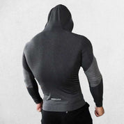 Grey Men's quick-drying fitness hoodie with raglan sleeves for enhanced flexibility.