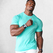 Gym Athlete wearing Light Green Man Printed Quick-Dry Compression Gym T-Shirt – Breathable & Performance-Driven Activewear