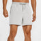 Close-up of Light Grey GPW Men's Lightweight Quick-Dry Workout Shorts with Pockets in a studio background