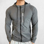 Model wearing Light Grey Men's Elastic Hooded Performance Hoodie Designed for Gym and Running