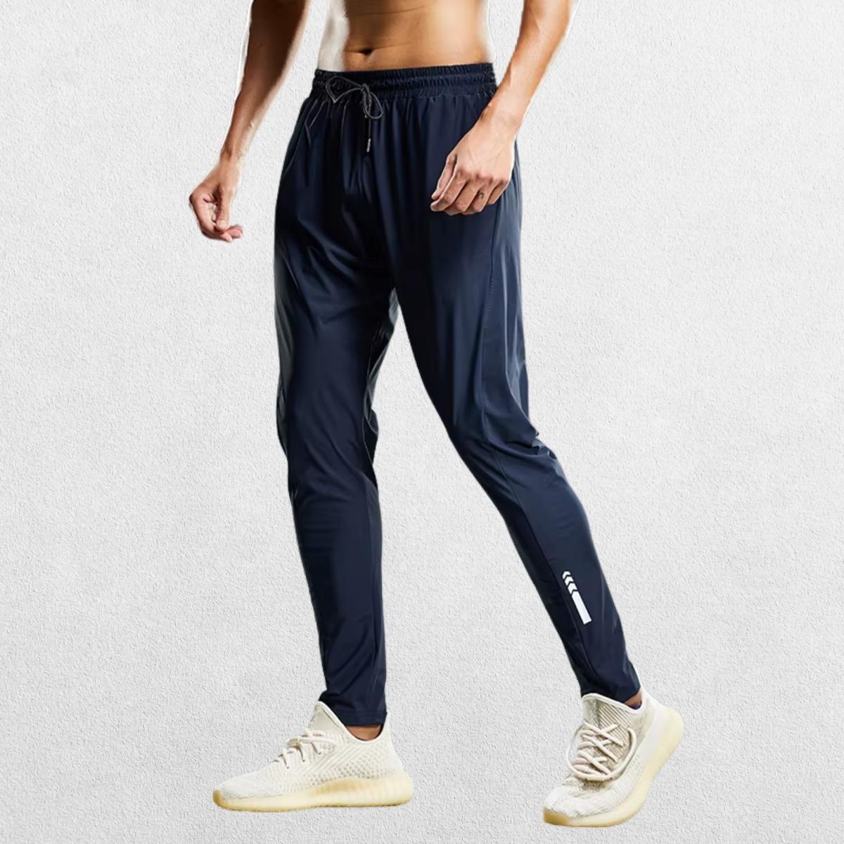 Classic navy blue jogging pants with a relaxed fit and moisture-wicking fabric.