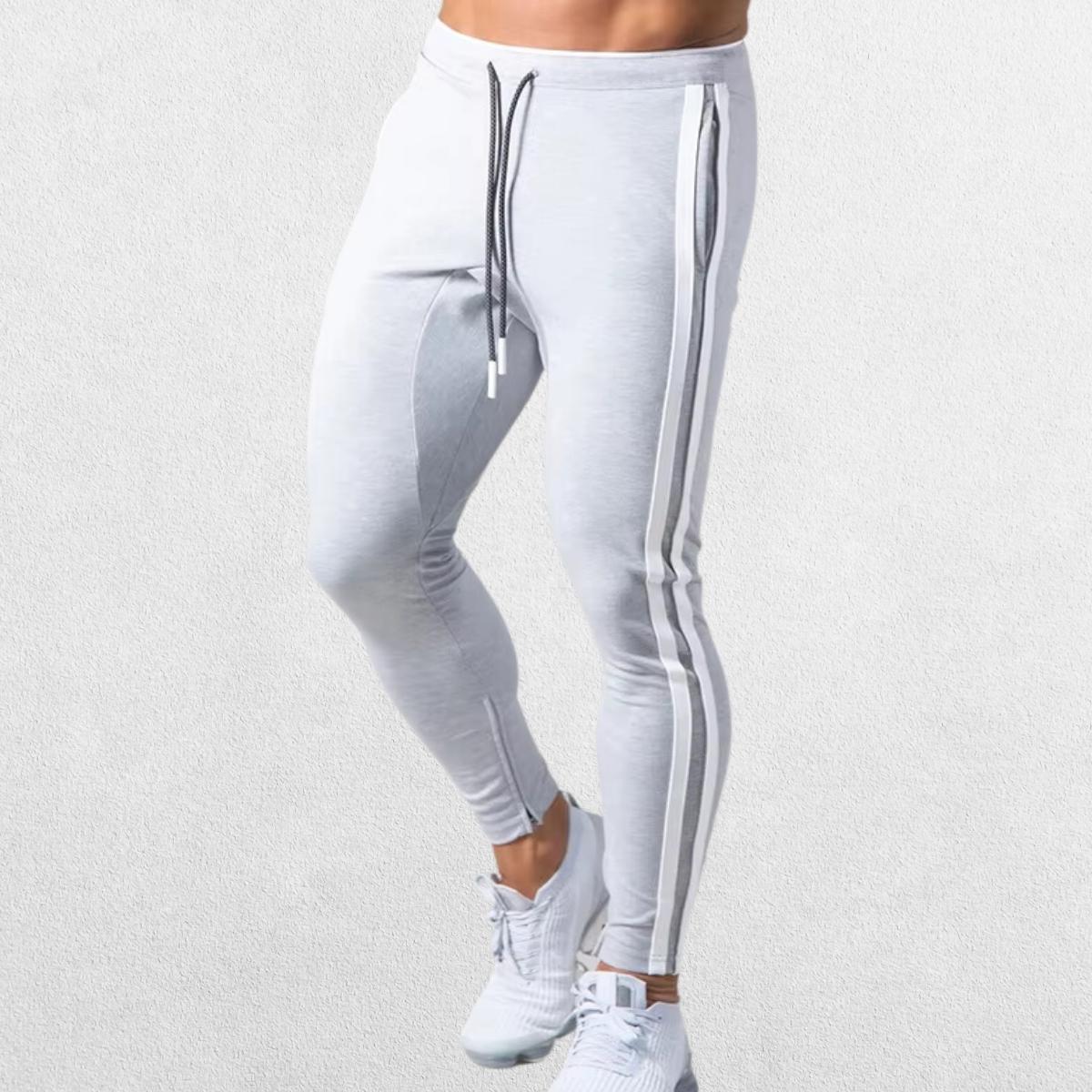 Men’s Striped Joggers in gray color with adjustable drawstring waist, showcasing a sleek and athletic fit.