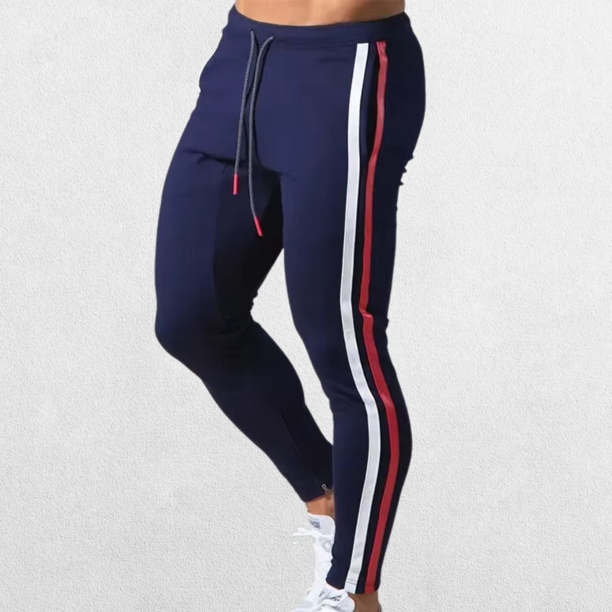 Navy blue Men’s Striped Joggers with adjustable drawstring waist and sleek athletic fit.