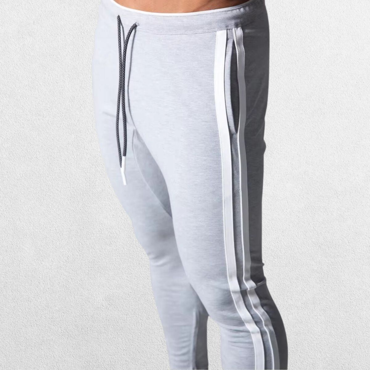 Closeup of gray Men’s Striped Joggers showcasing the premium fabric texture.