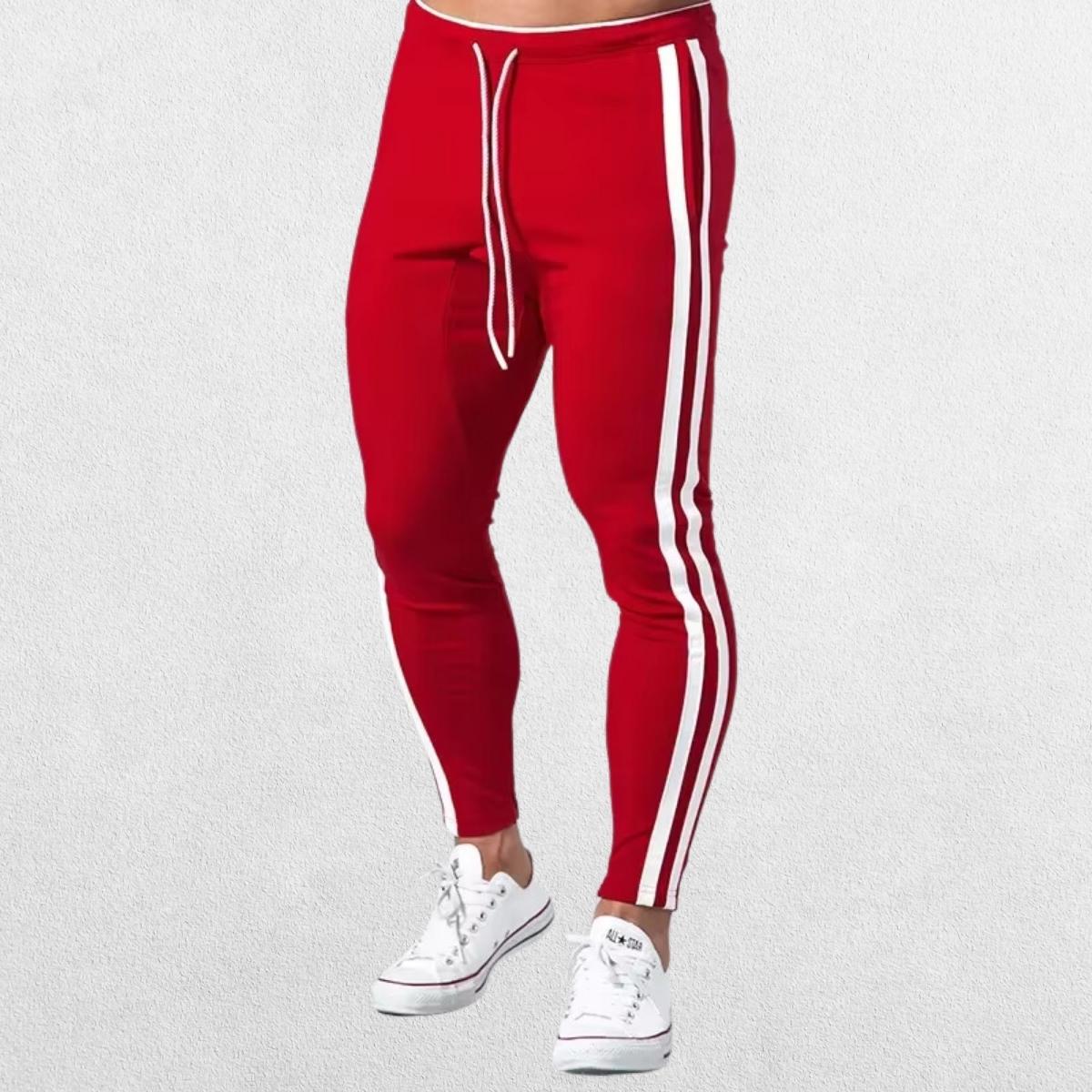 Front view of Men’s Striped Joggers in red, featuring an adjustable drawstring waistband and sporty stripe design.