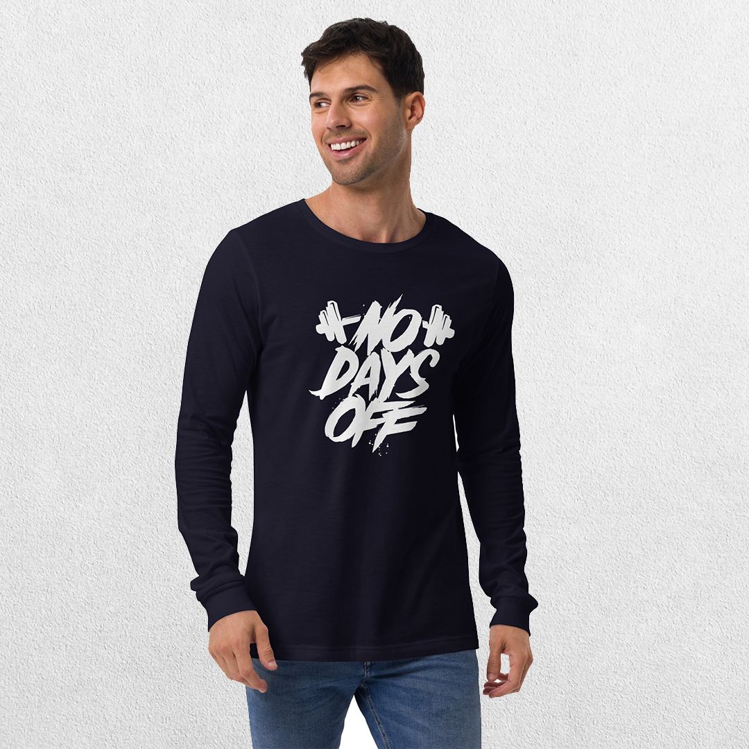 Model wearing the Navy No Days Off Unisex Long Sleeve Tee - Versatile Athletic and Casual Wear with jeans in studio background.