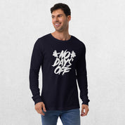 Model wearing the Navy No Days Off Unisex Long Sleeve Tee - Versatile Athletic and Casual Wear with jeans in studio background.