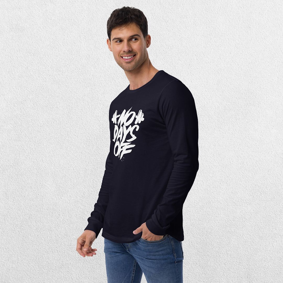 Model wearing the Navy No Days Off Unisex Long Sleeve Tee - Versatile Athletic and Casual Wear with jeans in studio background.