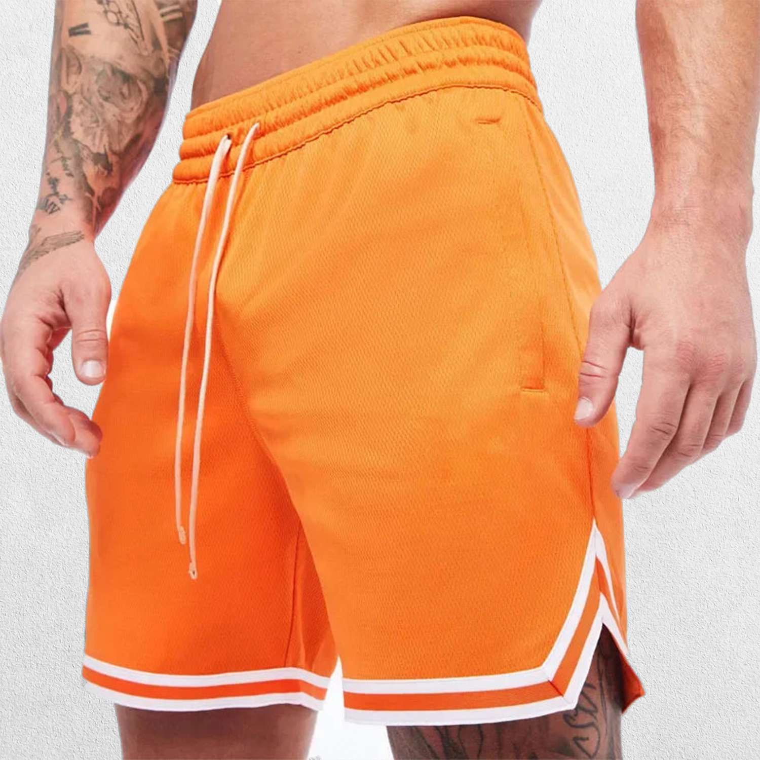 Front side Close-up of Orange GPW Men's Quick-Dry Gym Shorts - Summer Fitness and Sportswear in a studio background