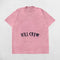 Close-up of Pink acid-wash fabric texture on Kill Crew Summer Tee.