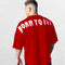Model wearing Red GPW Oversized T-Shirt, styled for streetwear and gym.