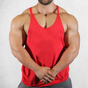 Front View of Model Wearing Red Men's Solid Color Cotton Y-Back Sleeveless Tank Tops for Gym Muscle Training & Athletic Workout