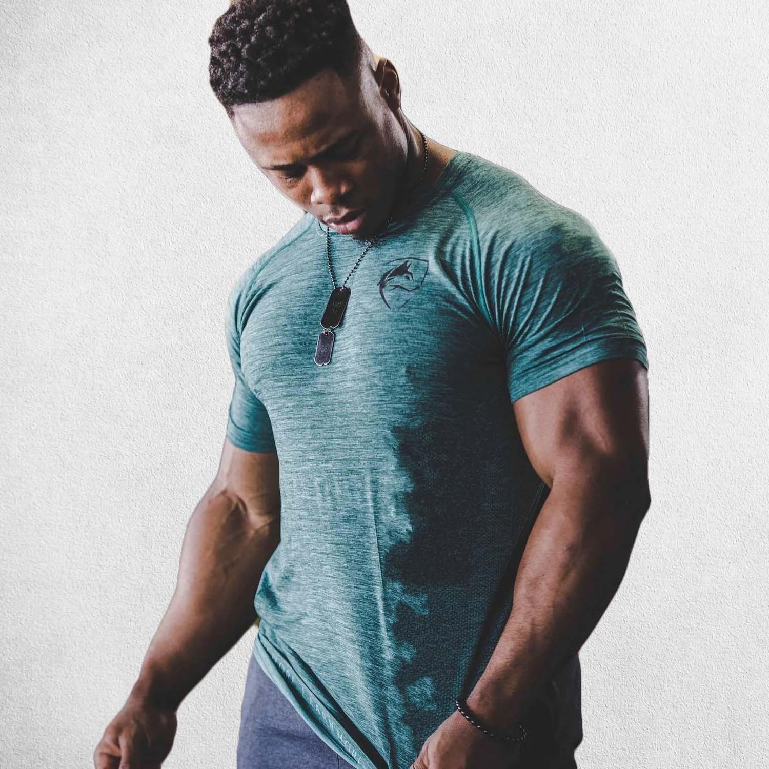 Gym Athlete wearing Sky BLue Men’s Quick-Dry Bodybuilding Tight Muscle Shirt – Compression Fit for Fitness & Sports
