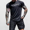 Model wearing Summer T-shirt Jogger Quick Dry Sports Shirt in black color