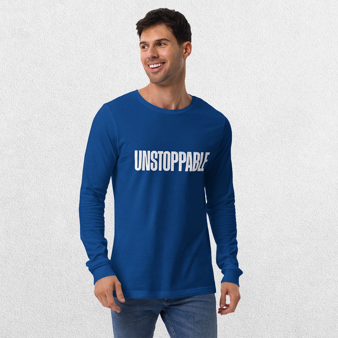 Model wearing the True Royal GPW Unisex Long Sleeve Tee with Unstoppable Design with jeans.