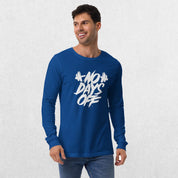 Model wearing the True Royal No Days Off Unisex Long Sleeve Tee - Versatile Athletic and Casual Wear with jeans in studio background.