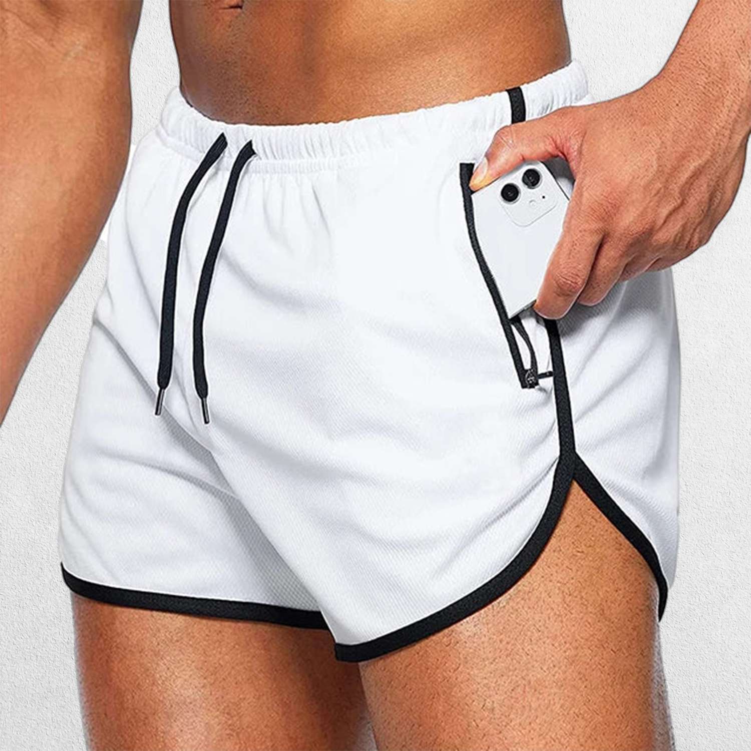 Close-up of Model Wearing White GPW Men’s Running Shorts With Essentail Mobile pockets 