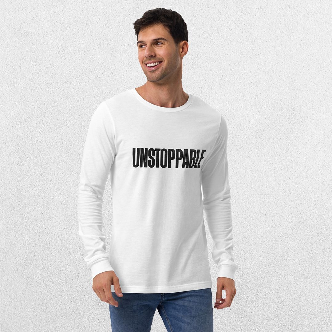 Model wearing the White GPW Unisex Long Sleeve Tee with Unstoppable Design with jeans.