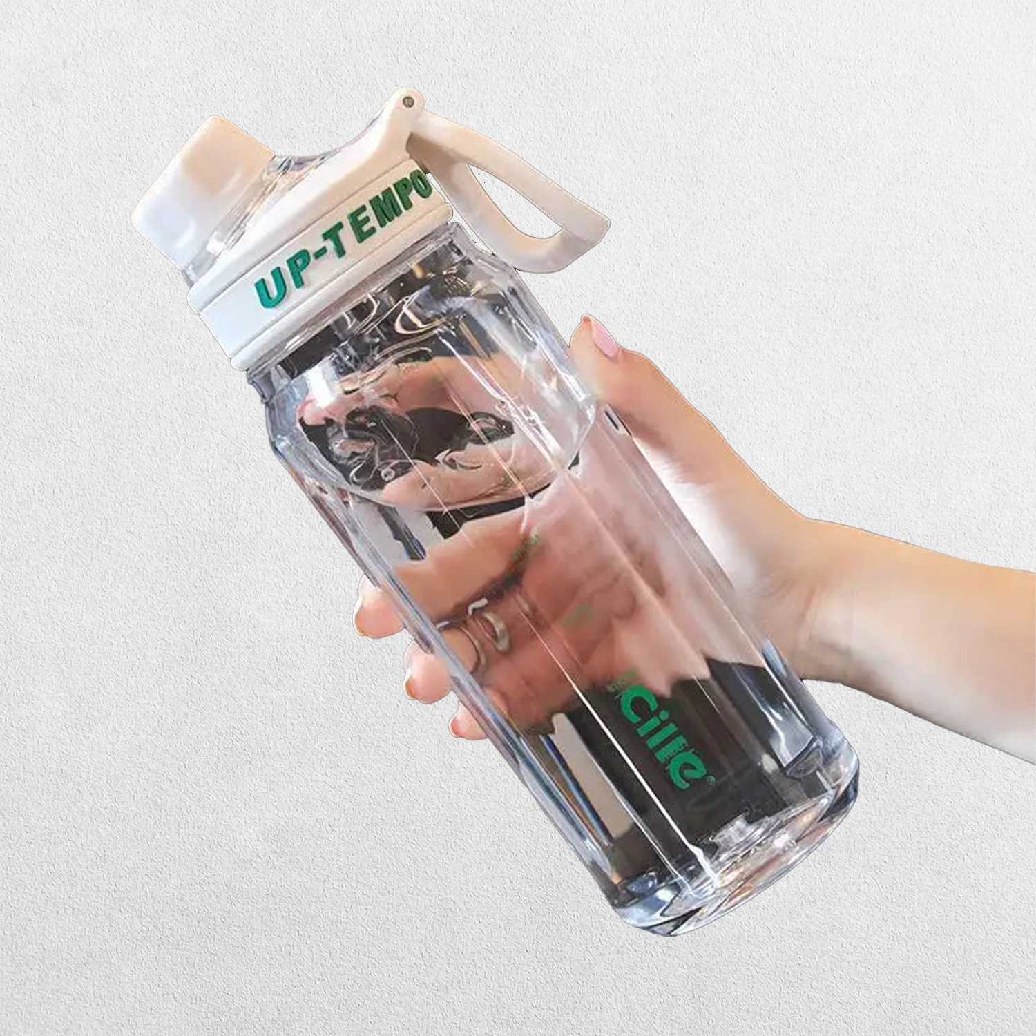 A Person Holding White High-Quality Tritan Water Bottle with Built-In Filter for Gym & Outdoors