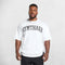 Front View of Model Wearing White Loose Fit Oversized Gym Tee – Heavyweight Cotton, Premium Comfort & Strength