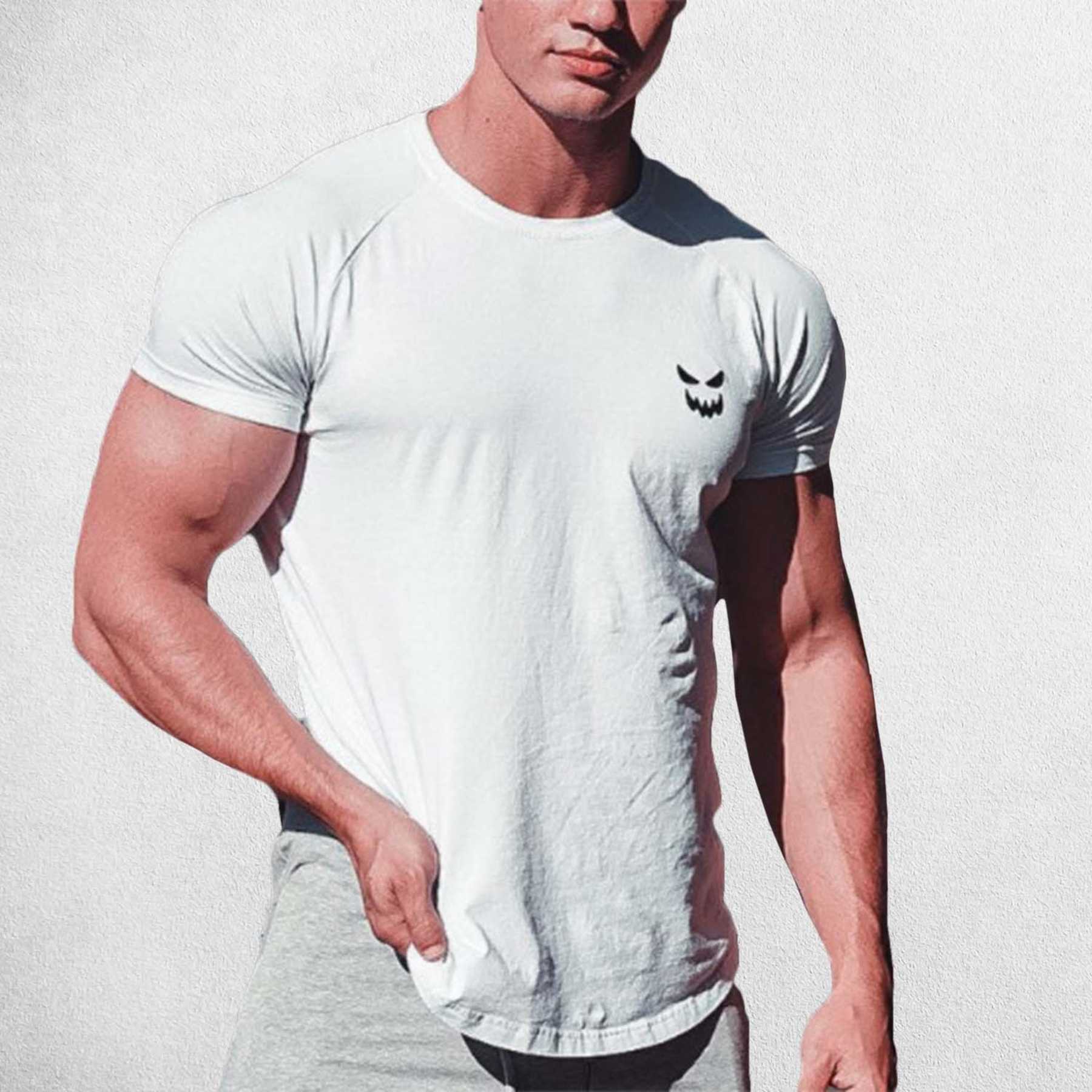 Model Wearing White Men’s Muscle-Fit Cotton Gym T-Shirt – Breathable & Stretchable Workout Tee in a studio background