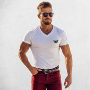 Front View of Model Wearing White Men’s V-Neck Slim Fit Gym T-Shirt – Breathable, Muscle-Enhancing Cotton Tee for Training & Casual Wear