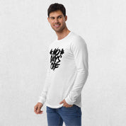 Model wearing the White No Days Off Unisex Long Sleeve Tee - Versatile Athletic and Casual Wear with jeans in studio background