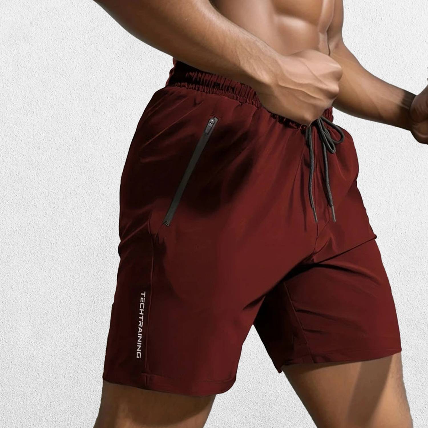Side Pose of Model Wearing Wine Red GPW Men's Stylish Polyester Athletic Shorts with Elastic Waist